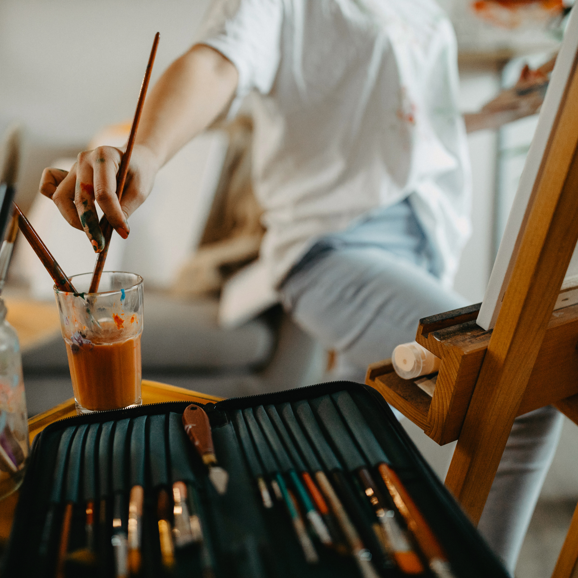 Close-up of artist hand creating detailed artwork